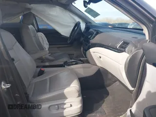 2019 Honda Pilot Touring 7-Passenger with VIN 5FNYF6H67KB018769, listed as a IAAI auction lot 41310452 with 92,499 mi miles. Bid and sale history available at carsss.com. Image 5.