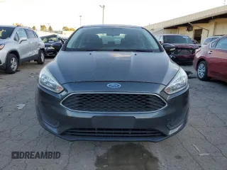 2017 Ford Focus SE z VIN 1FADP3F25HL331714, wystawiony jako Copart lot #77389764 z przebiegiem 49 953 mil mil oraz Szkoda całkowita • Salvage title. Historia ofert i sprzedaży dostępna na DreamBid. Obrazek 5.