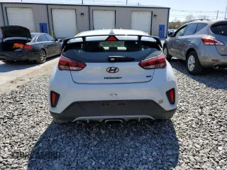 2020 Hyundai Veloster 2.0 с VIN KMHTG6AF7LU027994, выставлен на аукционе Copart как лот 52065775 с пробегом 87 433 миль миль и Списание • Salvage title. История ставок и продаж доступна на DreamBid. Изображение 6.