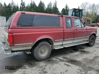 1993 Ford F-150 with VIN 1FTEX14H6PKB86844, listed as a Copart auction lot 52012705 with 127,784 mi miles and Salvage title. Bid and sale history available at DreamBid. Image 3.