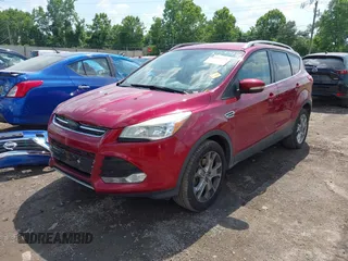 2015 Ford Escape Titanium z VIN 1FMCU9J91FUC58933, wystawiony jako IAAI lot #42583736 z przebiegiem 147 359 mil mil oraz . Historia ofert i sprzedaży dostępna na DreamBid. Obrazek 17.
