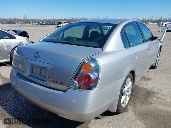 2003 Nissan Altima S with VIN 1N4AL11D63C321486, listed as a IAAI auction lot 41581386 with 200,082 mi miles. Bid and sale history available at carsss.com. Image 4.