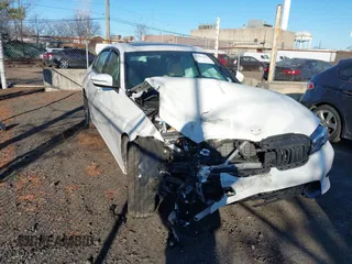 2020 BMW 3 Series 330i xDrive with VIN 3MW5R7J00L8B34288, listed as a IAAI auction lot 41421442 with 43,930 mi miles. Bid and sale history available at carsss.com. Image 1.