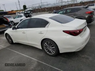 2019 Infiniti Q50 Luxe with VIN JN1EV7APXKM541762, listed as a Copart auction lot 59035515 with 59,295 mi miles and Salvage title. Bid and sale history available at DreamBid. Image 2.