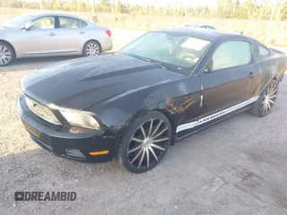 2011 Ford Mustang V6 with VIN 1ZVBP8AM6B5160195, listed as a IAAI auction lot 41803594 with 146,244 mi miles and . Bid and sale history available at carsss.com. Image 2.