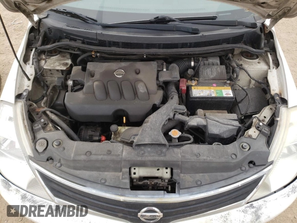 2010 Nissan Versa S z VIN 3N1BC1CP1AL447295, wystawiony jako Copart lot #53544455 z przebiegiem 310 809 mil mil oraz Szkoda całkowita • Salvage title. Historia ofert i sprzedaży dostępna na DreamBid. Obrazek 11.