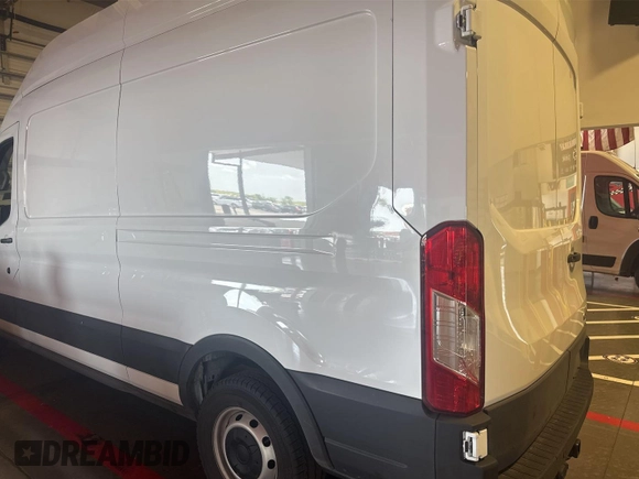 2023 Ford Transit Cargo with VIN 1FTBR1X86PKC09421, listed as a IAAI auction lot 42796097 with 10,233 mi miles and . Bid and sale history available at DreamBid. Image 27.
