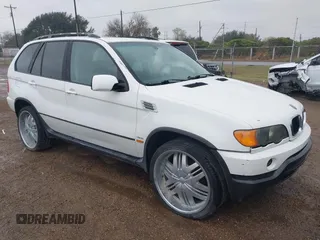 2002 BMW X5 3.0i with VIN 5UXFA53542LV72703, listed as a IAAI auction lot 41636879 with 1 mi miles. Bid and sale history available at carsss.com. Image 1.