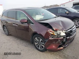 2015 Honda Odyssey Touring Elite with VIN 5FNRL5H9XFB026405, listed as a IAAI auction lot 41780562 with 134,897 mi miles and . Bid and sale history available at DreamBid. Image 1.