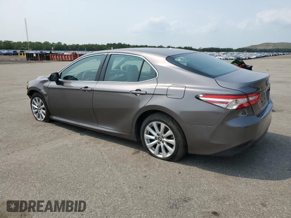 2018 Toyota Camry LE with VIN 4T1B11HK1JU141022, listed as a Copart auction lot 60135785 with 112,652 mi miles and Salvage title. Bid and sale history available at DreamBid. Image 2.