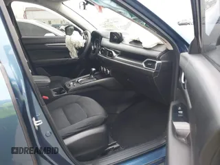 2017 Mazda CX-5 Sport with VIN JM3KFABL9H0142189, listed as a IAAI auction lot 41722354 with 109,865 mi miles. Bid and sale history available at carsss.com. Image 5.