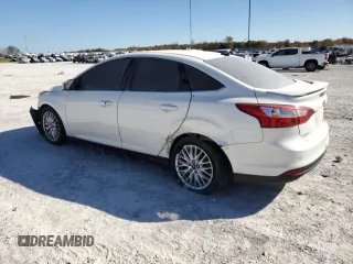 2014 Ford Focus Titanium with VIN 1FADP3J20EL122447, listed as a Copart auction lot 75774344 with 188,413 mi miles and Salvage Title. Bid and sale history available at carsss.com. Image 2.