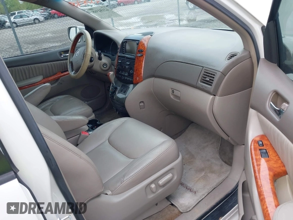 2006 Toyota Sienna XLE with VIN 5TDZA22C36S547762, listed as a IAAI auction lot 42182368 with 166,023 mi miles. Bid and sale history available at carsss.com. Image 5.