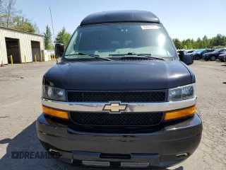 2018 Chevrolet Express Cargo Van with VIN 1GCWGBFG5J1242705, listed as a Copart auction lot 55627615 with 77,611 mi miles and Clean Title. Bid and sale history available at carsss.com. Image 5.
