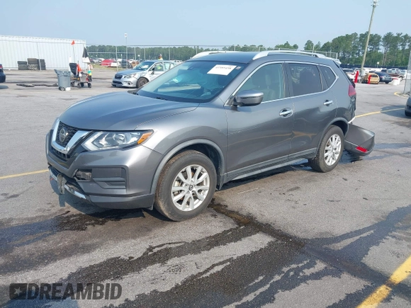 2019 Nissan Rogue SV with VIN KNMAT2MT2KP544859, listed as a IAAI auction lot 42389458 with 80,976 mi miles and . Bid and sale history available at DreamBid. Image 2.