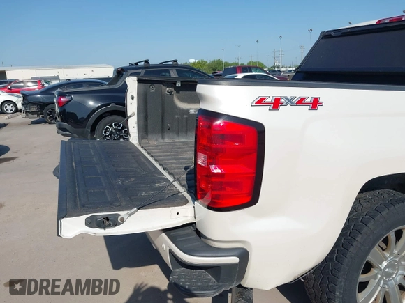 2014 Chevrolet Silverado 1500 High Country with VIN 3GCUKTEC4EG409072, listed as a IAAI auction lot 41986843 with 124,058 mi miles. Bid and sale history available at carsss.com. Image 18.