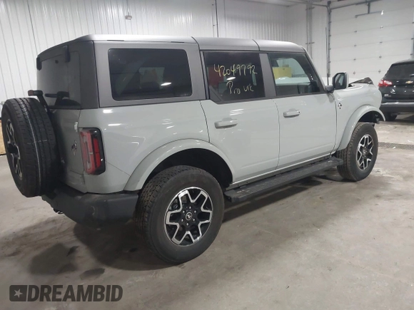 2023 Ford Bronco with VIN 1FMEE5BP7PLC09674, listed as a IAAI auction lot 42049792 with 25,937 mi miles and . Bid and sale history available at DreamBid. Image 4.