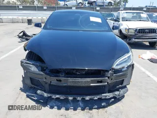 2017 Tesla Model S 60 with VIN 5YJSA1E17HF232699, listed as a IAAI auction lot 42327539 with 113,923 mi miles and . Bid and sale history available at DreamBid. Image 6.