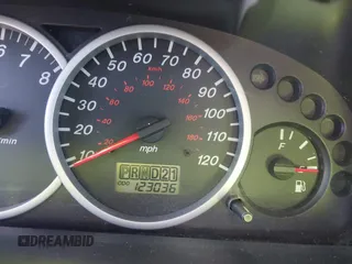 2004 Mazda Tribute LX with VIN 4F2CZ941X4KM19302, listed as a IAAI auction lot 41791389 with 123,036 mi miles. Bid and sale history available at carsss.com. Image 7.