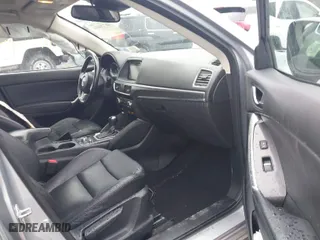 2016 Mazda CX-5 Grand Touring with VIN JM3KE4DY0G0816466, listed as a IAAI auction lot 41720059 with NaN miles. Bid and sale history available at carsss.com. Image 5.