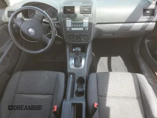 2007 Volkswagen Rabbit с VIN WVWBR71KX7W199198, выставлен на аукционе Copart как лот 50497005 с пробегом 68 900 миль миль и Списание • Salvage title. История ставок и продаж доступна на DreamBid. Изображение 8.