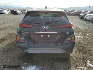 2021 Hyundai Kona Ultimate with VIN KM8K5CA54MU748847, listed as a Copart auction lot 82665484 with 49,523 mi miles and Salvage Title. Bid and sale history available at carsss.com. Image 6.