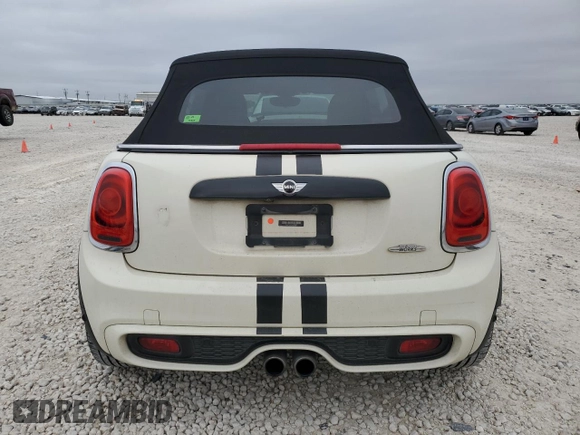 2017 MINI Convertible Cooper S z VIN WMWWG9C52H3C22972, wystawiony jako Copart lot #87302554 z przebiegiem 83 123 mil mil oraz Szkoda całkowita • Salvage title. Historia ofert i sprzedaży dostępna na DreamBid. Obrazek 6.