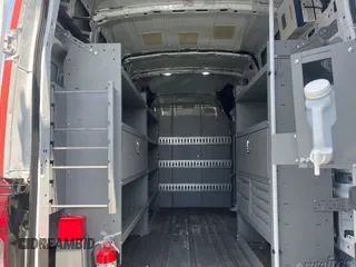 2023 Ford Transit Cargo with VIN 1FTBR1X87PKC09251, listed as a IAAI auction lot 42762766 with 20,509 mi miles and . Bid and sale history available at DreamBid. Image 3.