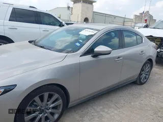 2024 Mazda 3 2.5 S Preferred with VIN 3MZBPACMXRM414340, listed as a IAAI auction lot 42134789 with 28,038 mi miles. Bid and sale history available at carsss.com. Image 6.
