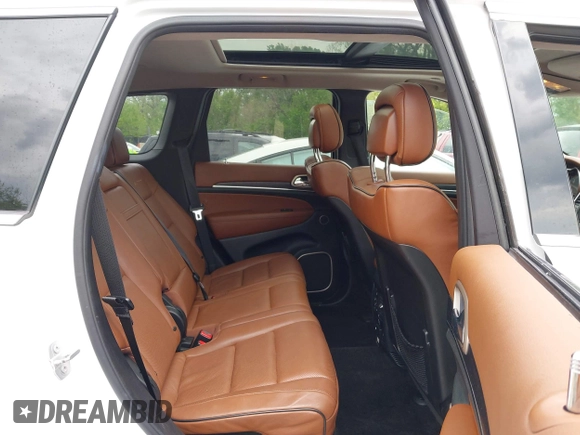 2015 Jeep Grand Cherokee Summit with VIN 1C4RJFJG5FC104087, listed as a IAAI auction lot 42100298 with 88,710 mi miles and . Bid and sale history available at DreamBid. Image 8.