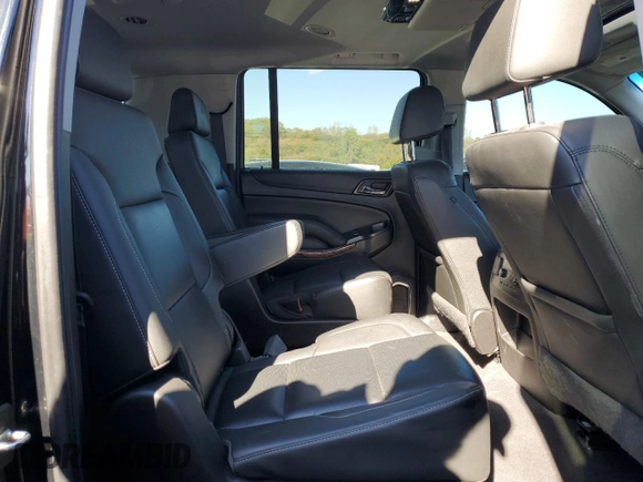2019 Chevrolet Suburban Premier with VIN 1GNSKJKJ6KR134774, listed as a Copart auction lot 76118314 with 69,523 mi miles and Salvage Title. Bid and sale history available at DreamBid. Image 11.