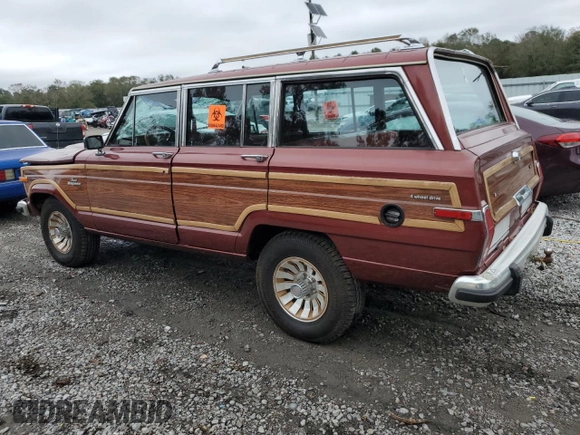 1986 Jeep Grand Wagoneer z VIN 1JCNJ15U6GT029563, wystawiony jako Copart lot #78917364 z przebiegiem 115 025 mil mil oraz Szkoda całkowita • Salvage title. Historia ofert i sprzedaży dostępna na DreamBid. Obrazek 2.