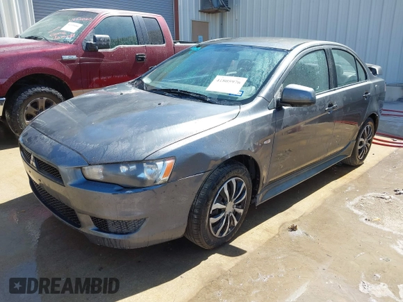 2010 Mitsubishi Lancer DE with VIN JA32U1FU1AU033241, listed as a IAAI auction lot 41805976 with 214,606 mi miles. Bid and sale history available at carsss.com. Image 2.