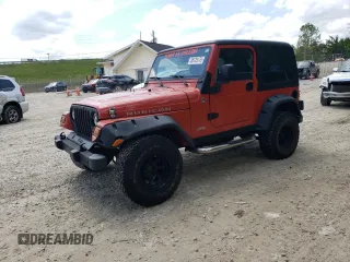 2006 Jeep Wrangler Rubicon with VIN 1J4FA69S06P753097, listed as a Copart auction lot 58125175 with 153,911 mi miles and Salvage title. Bid and sale history available at DreamBid. Image 1.