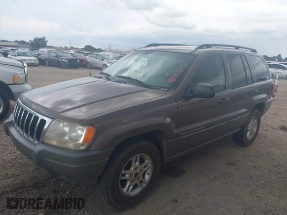 2002 Jeep Grand Cherokee Laredo with VIN 1J4GX48S32C168105, listed as a IAAI auction lot 42451373 with 293,790 mi miles and . Bid and sale history available at DreamBid. Image 2.