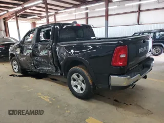 2025 Ram 1500 Big Horn with VIN 1C6SRFFPXSN591196, listed as a Copart auction lot 52577325 with 14,036 mi miles and Salvage Title. Bid and sale history available at carsss.com. Image 2.