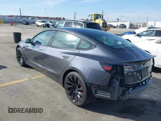 2023 Tesla Model 3 Performance with VIN 5YJ3E1EC4PF705449, listed as a IAAI auction lot 41587026 with 30,292 mi miles. Bid and sale history available at carsss.com. Image 3.
