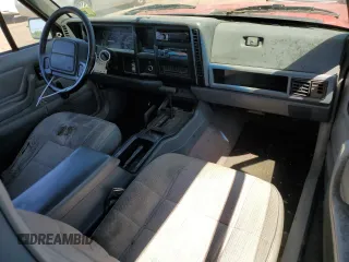 1995 Jeep Cherokee Sport with VIN 1J4FJ67S6SL549912, listed as a Copart auction lot 61104474 with 296,507 mi miles and Clean Title. Bid and sale history available at carsss.com. Image 8.