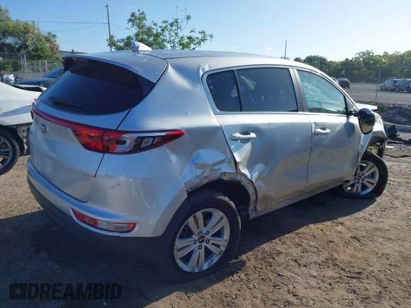 2019 Kia Sportage LX with VIN KNDPM3AC8K7591055, listed as a IAAI auction lot 41962190 with 74,003 mi miles. Bid and sale history available at carsss.com. Image 4.