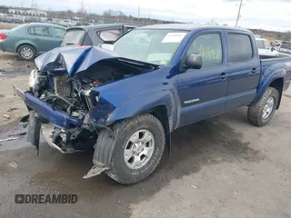 2014 Toyota Tacoma with VIN 3TMLU4EN0EM147243, listed as a IAAI auction lot 41684902 with 308,167 mi miles. Bid and sale history available at carsss.com. Image 2.
