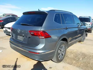 2020 Volkswagen Tiguan SE with VIN 3VV3B7AX6LM017819, listed as a IAAI auction lot 41612776 with 74,576 mi miles. Bid and sale history available at carsss.com. Image 4.