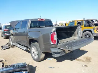 2015 GMC Canyon 2WD SLT with VIN 1GTG5CE33F1217775, listed as a IAAI auction lot 41485677 with 1 mi miles. Bid and sale history available at carsss.com. Image 3.