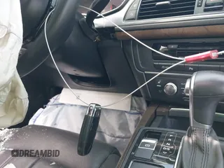2014 Audi A7 Prestige z VIN WAU2GAFC7EN126780, wystawiony jako IAAI lot #42095865 z przebiegiem Nie podano mil oraz . Historia ofert i sprzedaży dostępna na DreamBid. Obrazek 11.