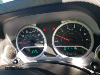 2007 Jeep Wrangler Unlimited Sahara with VIN 1J4GA59197L141821, listed as a Copart auction lot 76897044 with 124,070 mi miles and Salvage title. Bid and sale history available at DreamBid. Image 9.