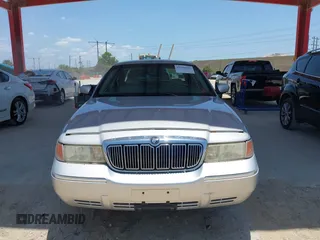 2001 Mercury Grand Marquis LS z VIN 2MEFM75W91X660964, wystawiony jako IAAI lot #42250931 z przebiegiem 74 462 mil mil oraz . Historia ofert i sprzedaży dostępna na DreamBid. Obrazek 6.