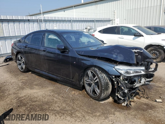 2017 BMW 7 Series 750i xDrive with VIN WBA7B0C57HG527064, listed as a Copart auction lot 62463405 with 103,454 mi miles and Salvage title. Bid and sale history available at DreamBid. Image 4.