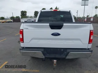 2018 Ford F-150 XL with VIN 1FTEW1CB4JKC87131, listed as a IAAI auction lot 42120579 with 93,143 mi miles. Bid and sale history available at carsss.com. Image 16.