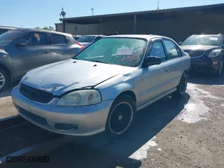 1999 Honda Civic VP with VIN 2HGEJ6616XH537100, listed as a IAAI auction lot 42018708 with 229,594 mi miles. Bid and sale history available at carsss.com. Image 2.
