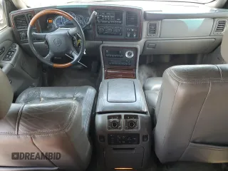 2002 Cadillac Escalade z VIN 1GYEC63T42R189976, wystawiony jako Copart lot #57852565 z przebiegiem 243 089 mil mil oraz Szkody całkowita. Historia ofert i sprzedaży dostępna na DreamBid. Obrazek 8.