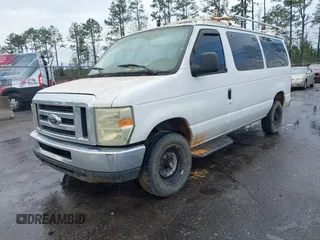 2008 Ford Econoline Passenger XL with VIN 1FBNE31LX8DA84628, listed as a IAAI auction lot 41670934 with 186,181 mi miles. Bid and sale history available at carsss.com. Image 2.